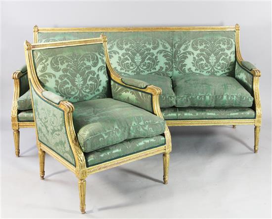 A Louis XVI style carved giltwood three piece salon suite,